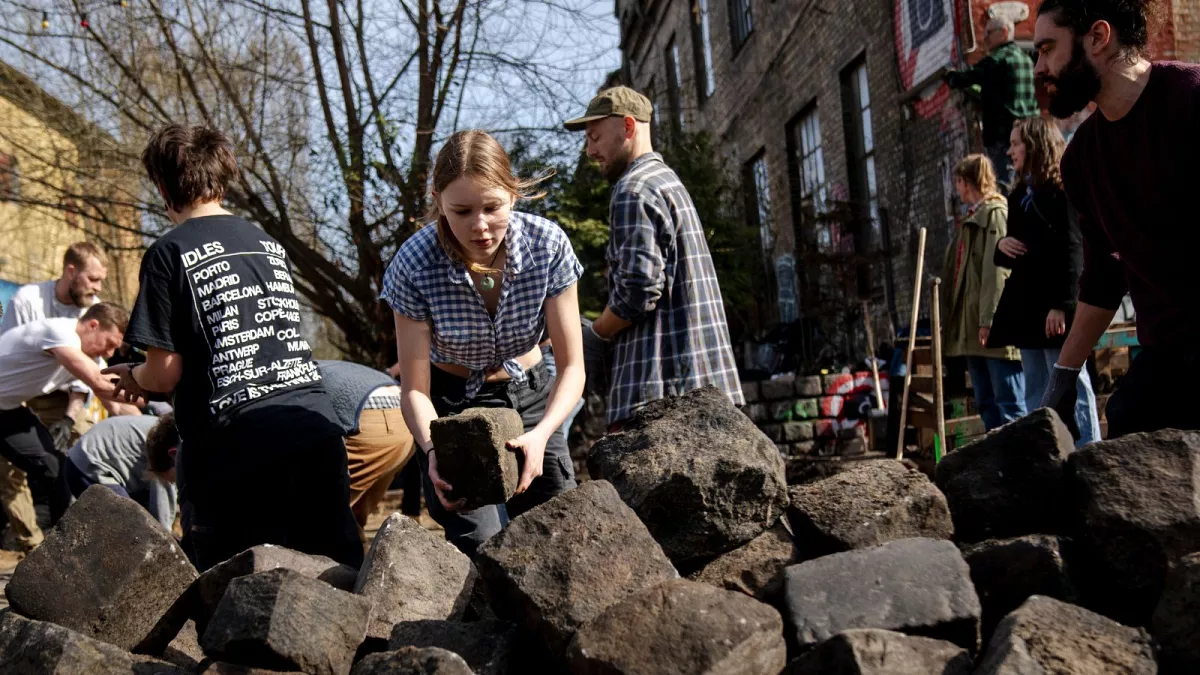 Danes in Copenhagen's drug dealers' neighborhood tore up the street pavement
