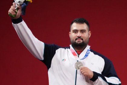 Ali Davoudi, the Iranian weightlifter, achieved runner-up and secured his quota for the Olympics
