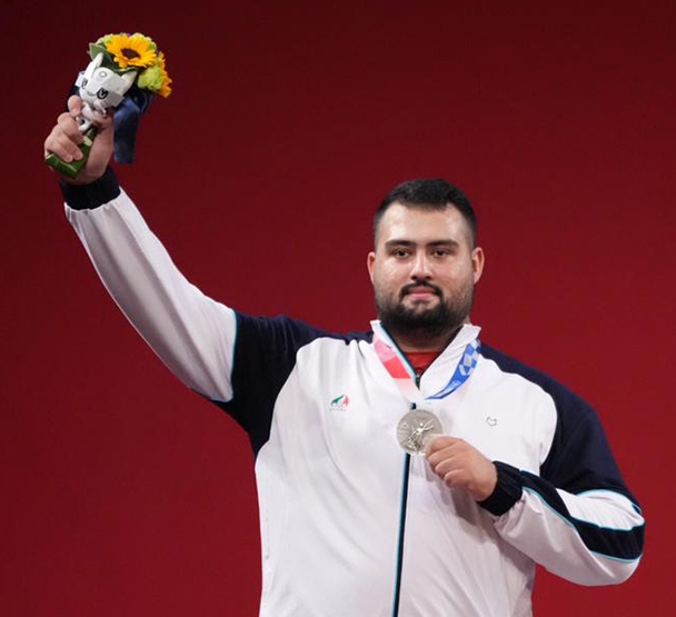 Ali Davoudi, the Iranian weightlifter, achieved runner-up and secured his quota for the Olympics